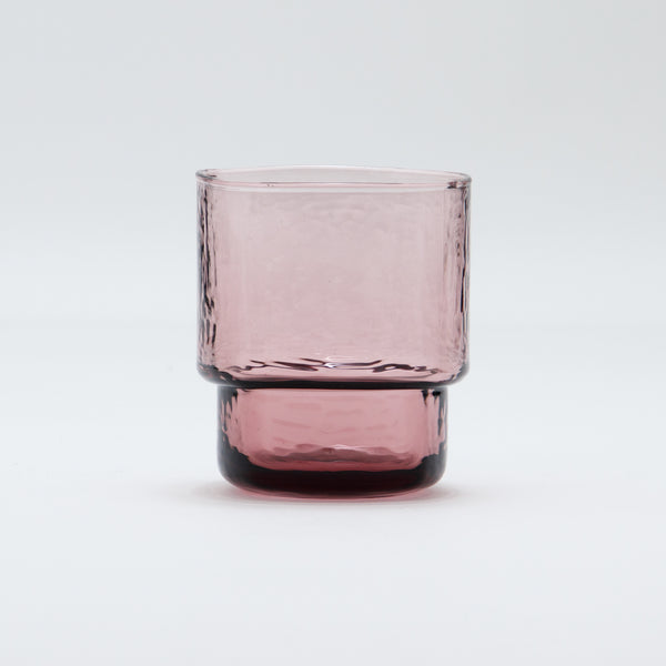 Handmade blown glass with a slim, angular shape that highlights its delicate texture. Its simple yet refined look and smooth feel make it a pleasure to use. Stackable and dishwasher safe, it’s both beautiful and practical for everyday use.