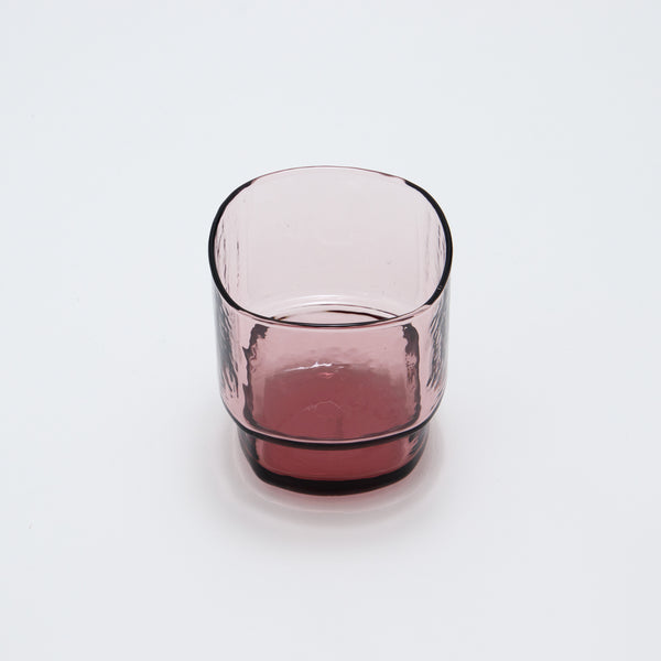 Handmade blown glass with a slim, angular shape that highlights its delicate texture. Its simple yet refined look and smooth feel make it a pleasure to use. Stackable and dishwasher safe, it’s both beautiful and practical for everyday use.