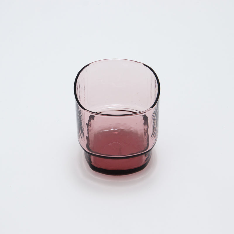 Handmade blown glass with a slim, angular shape that highlights its delicate texture. Its simple yet refined look and smooth feel make it a pleasure to use. Stackable and dishwasher safe, it’s both beautiful and practical for everyday use.