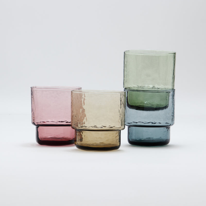 Handmade blown glass with a slim, angular shape that highlights its delicate texture. Its simple yet refined look and smooth feel make it a pleasure to use. Stackable and dishwasher safe, it’s both beautiful and practical for everyday use.